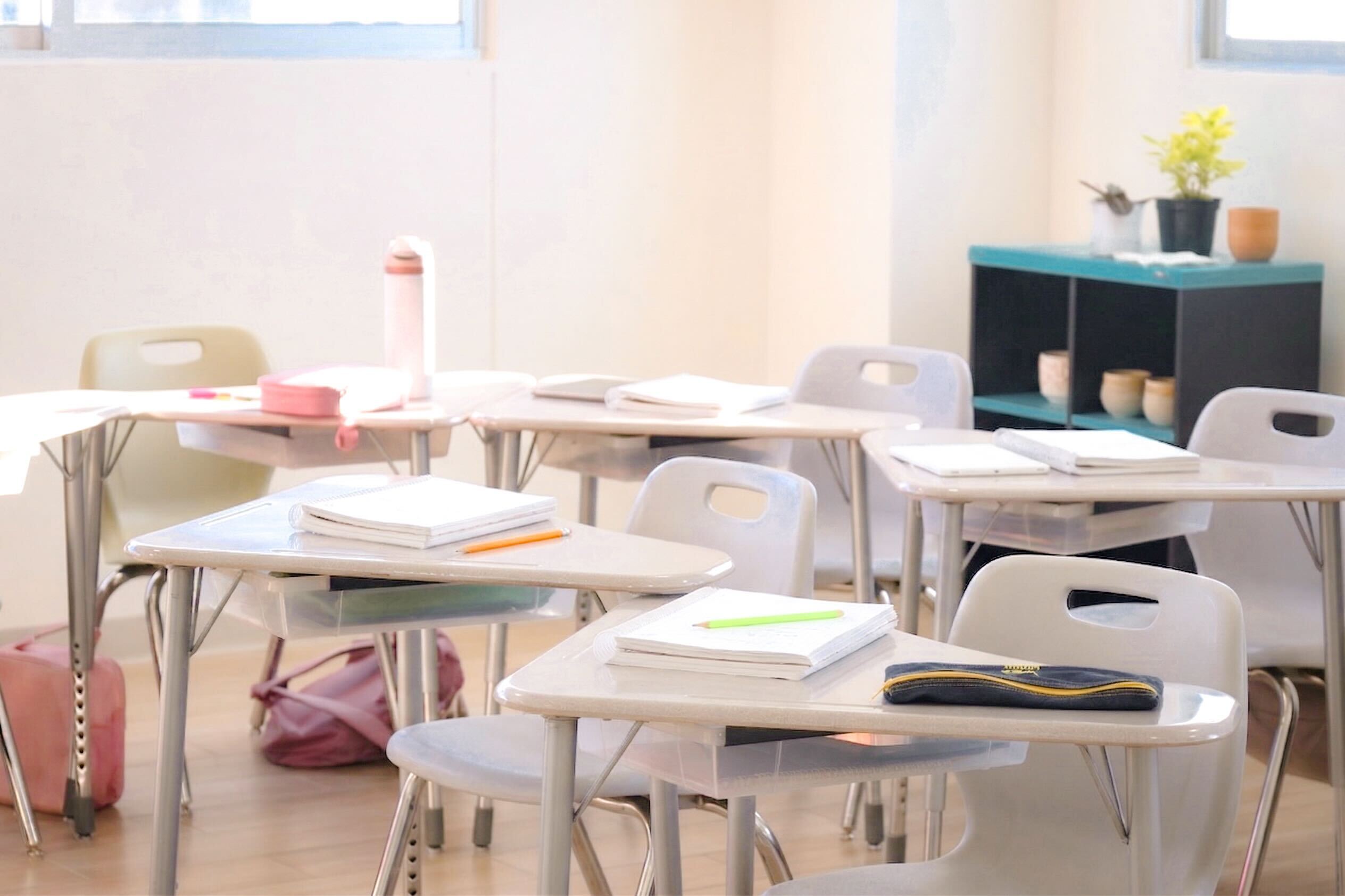 Newland Elementary classroom with notebooks and natural light at Zibata campus