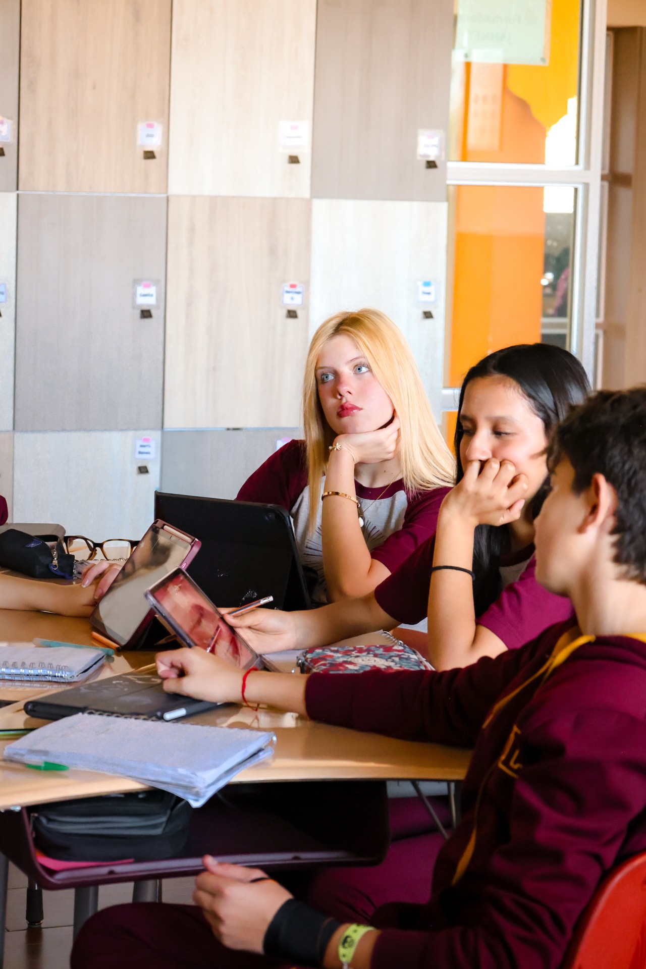 Students collaborating on a project at Newland